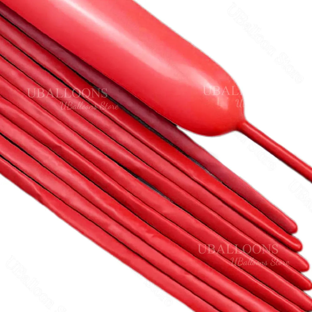 A bundle of red magic twisting balloons with long stems and tips.