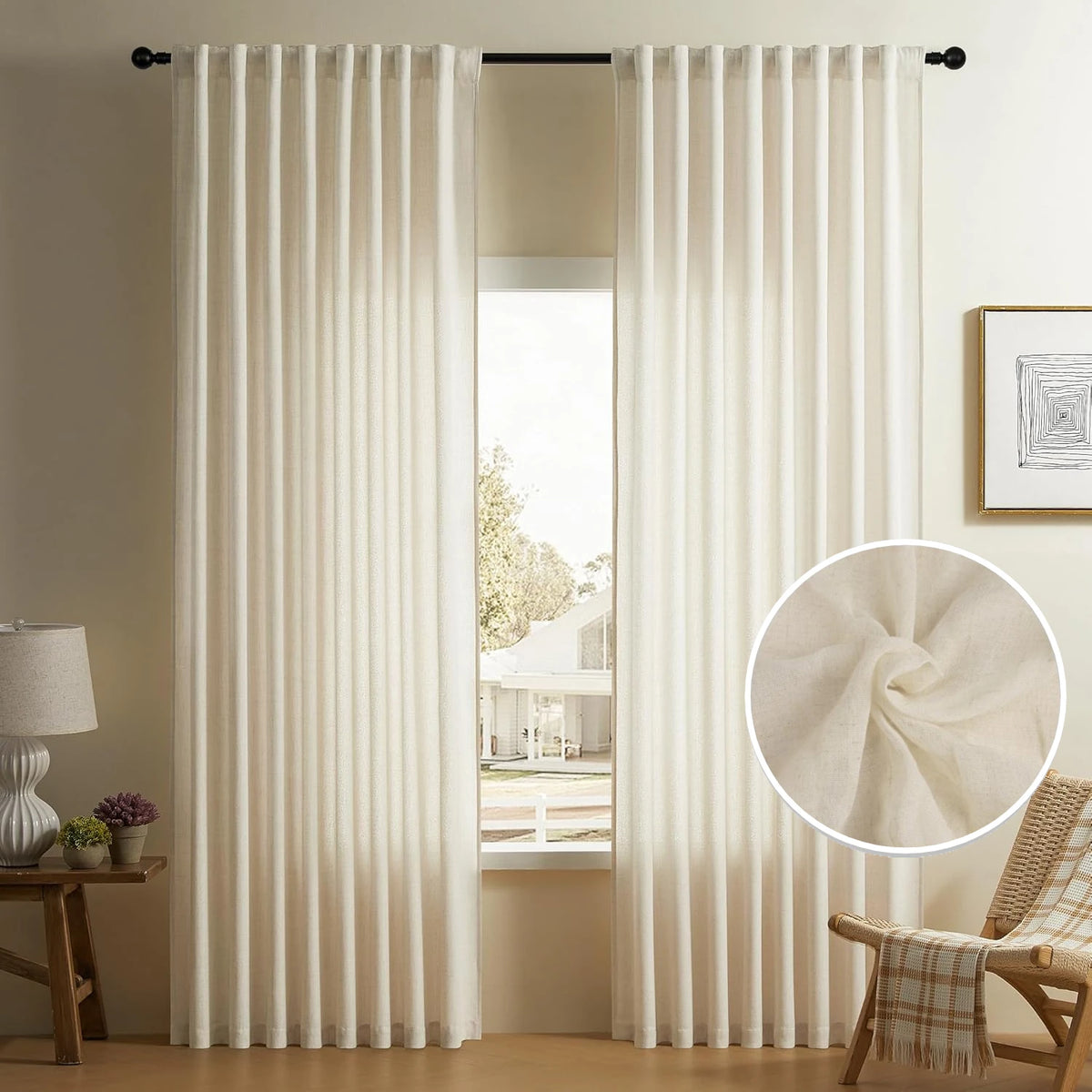 Natural linen sheer curtains with a rod pocket hanging in a doorway