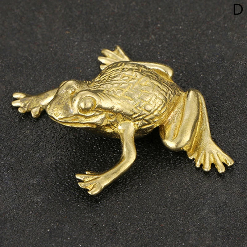 Una figura dorada de una rana, que representa la fortuna china para la riqueza y prosperidad.