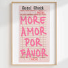A framed print featuring a pink guest check with the text MORE AMOR POR FAVOR on it.