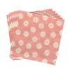 A stack of disposable pink napkins featuring a white daisy flower pattern.