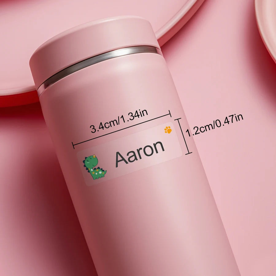 A pink waterproof name sticker bottle labeled Aaron with dimensions provided.