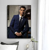 A modern wall art print featuring a portrait of Cristiano Ronaldo in a blue suit.