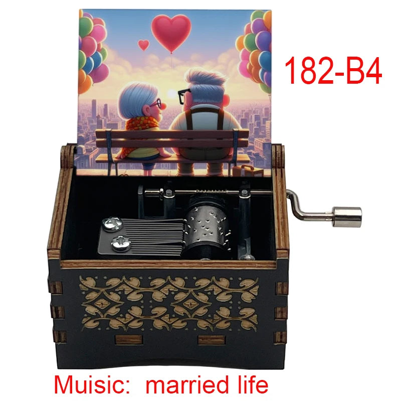 A wooden music box with a hand crank, featuring two figures and the title Music: married life.