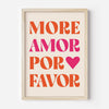 Framed canvas wall art with the text MORE AMOR POR FAVOR in orange and pink lettering on a cream background.