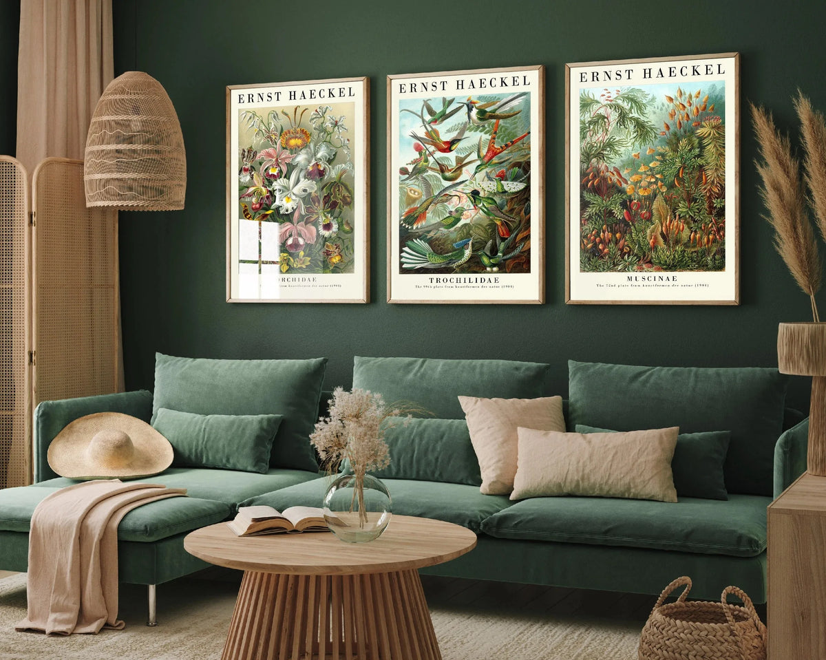 Three framed canvas prints depicting retro wildflower landscapes on a dark green wall.