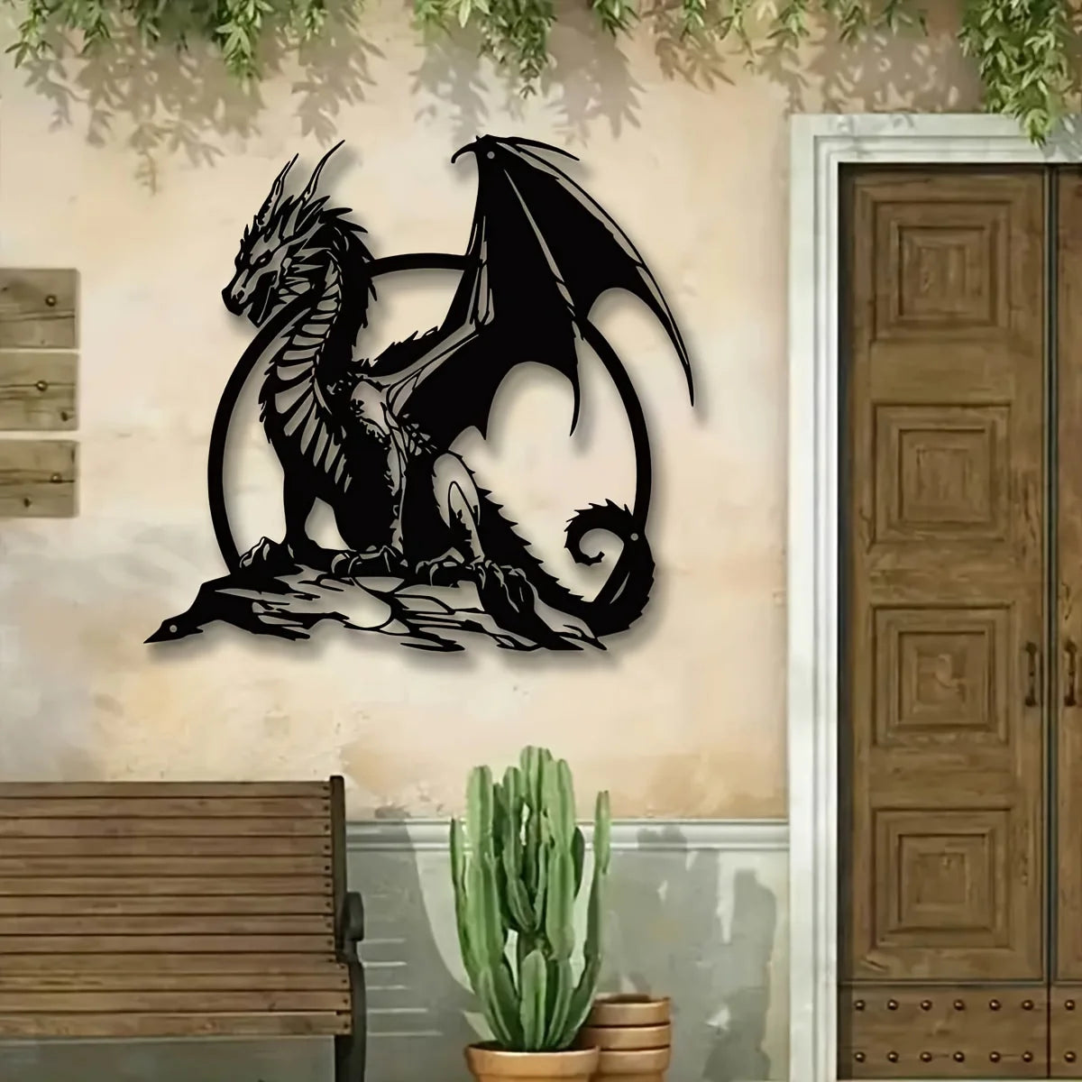 A black metal dragon wall sculpture with large wings is mounted on a light-colored wall.
