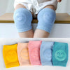 A collection of colorful knee pads for crawling infants in various pastel shades.