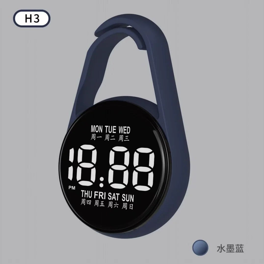 A dark blue LED pocket watch face displaying the time 18:88 and days of the week.