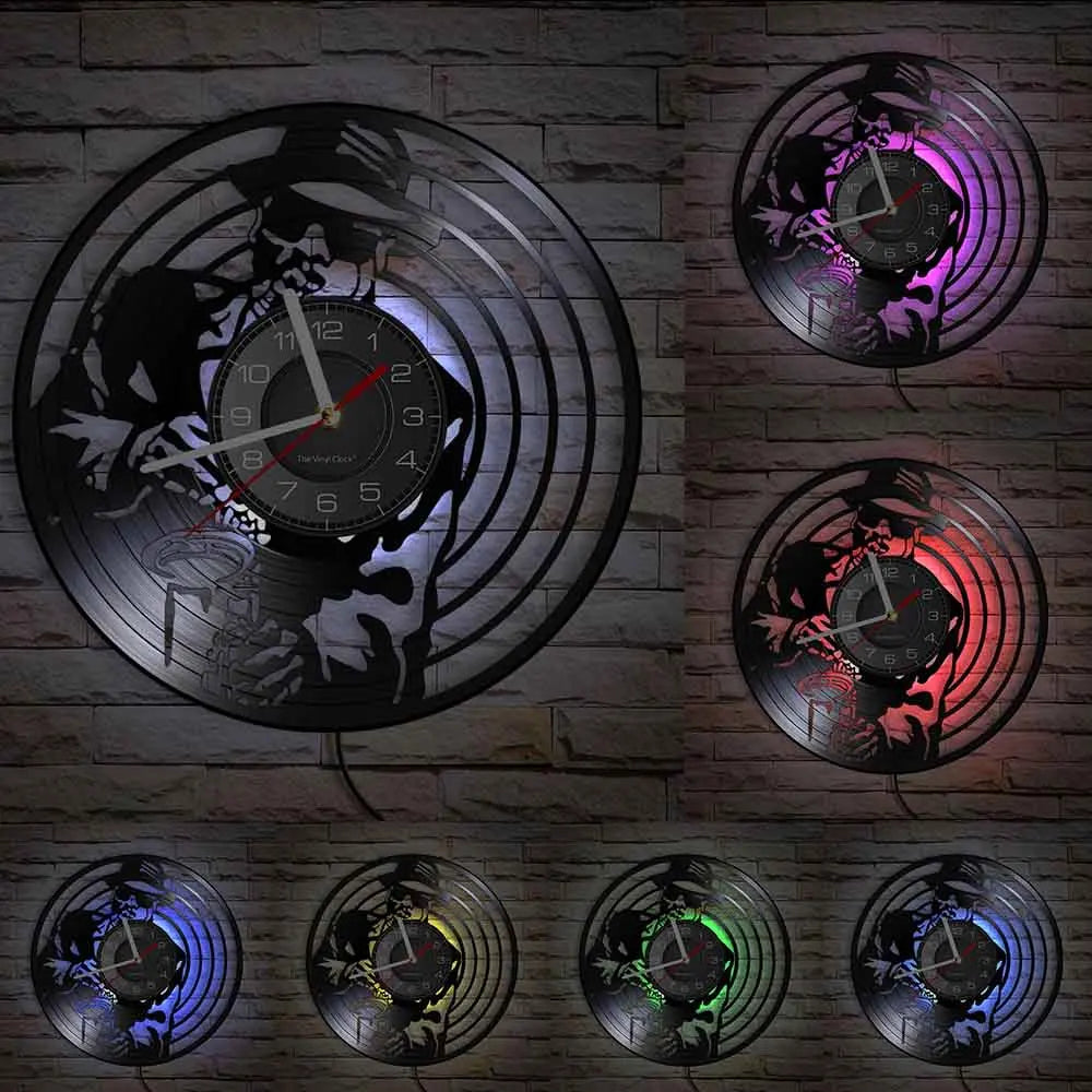 A collection of five vintage vinyl record wall clocks with black and purple designs mounted on a brick wall.