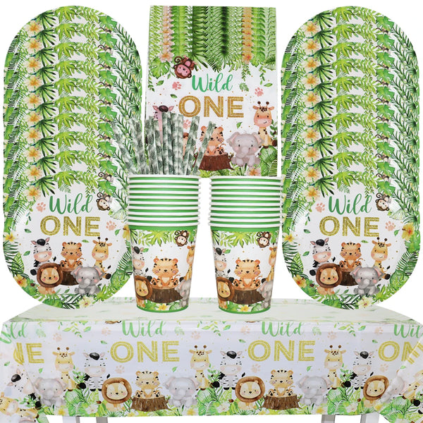 A set of green and white patterned tableware including plates, napkins, and cups for a Wild One safari jungle party.