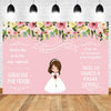 A pink and green floral backdrop for a First Communion celebration featuring a girl in a white dress.
