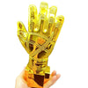 A golden glove award trophy shaped like a hand, held in a person's hand.