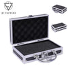 A silver aluminum storage box for a tattoo machine with reinforced corners and a hinged lid.