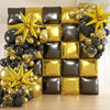 A wall display of black and gold foil balloons shaped into squares and stars for celebrations