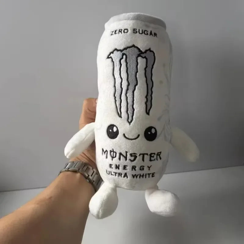A white soft plush toy shaped like an energy drink can with the text ZERO SUGAR and MONSTER ENERGY ULTRA WHITE.