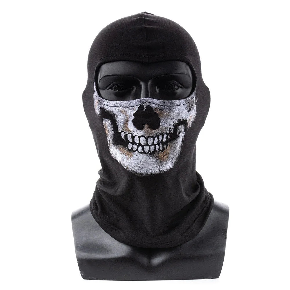 Black ice silk face mask with a white skull pattern covering the face
