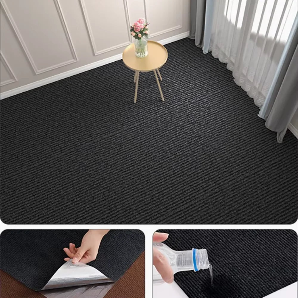 A close-up view of a black self-adhesive runner rug being applied to a wooden floor.