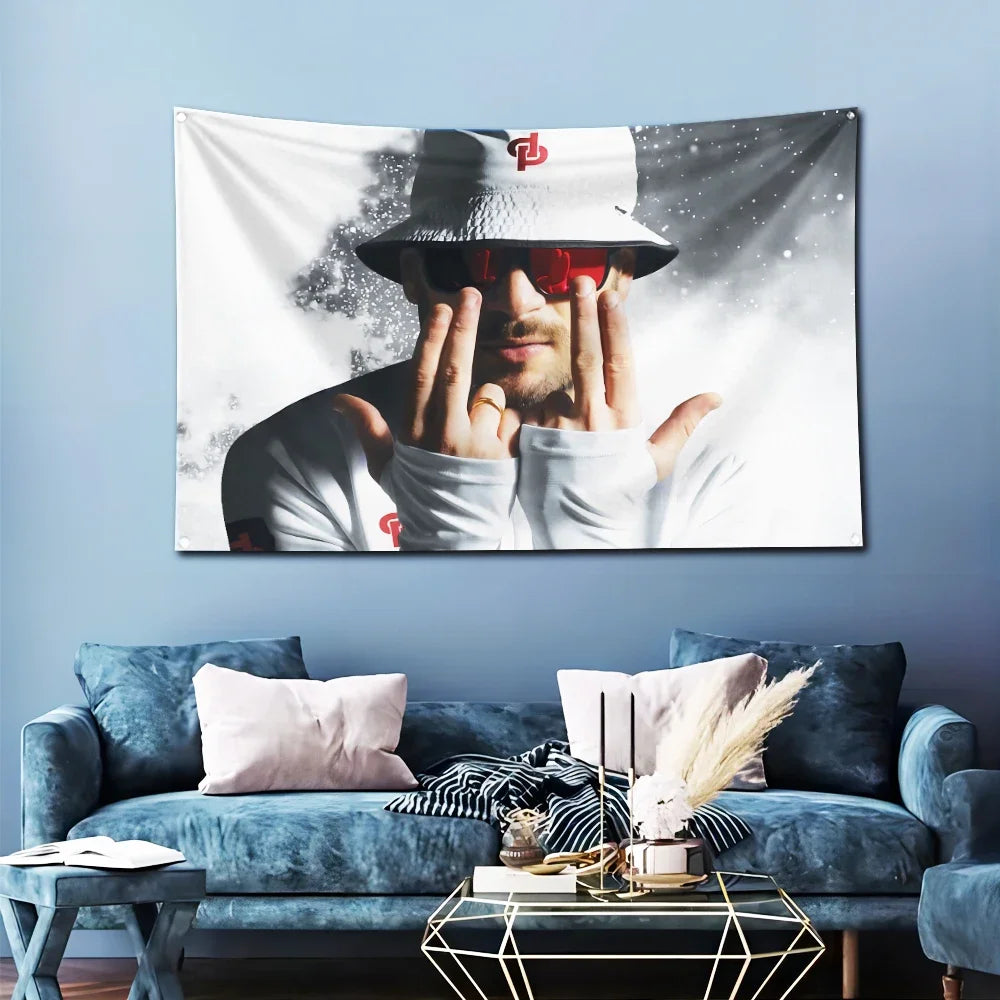 A banner featuring a man's face partially obscured by hands, wearing sunglasses, against a bright background.