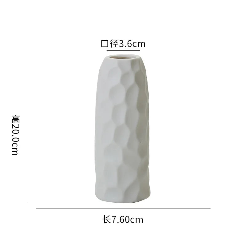 White ceramic desktop vase with an organic ripple texture, measuring 3.6cm in diameter and 20.0cm in height.