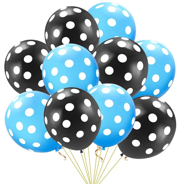 Un juego de globos de látex a rayas en negro y azul, atados con hilos de oro.
