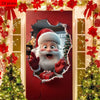 A festive Christmas decoration featuring Santa Claus peering through a torn frame on a red door with surrounding greenery and