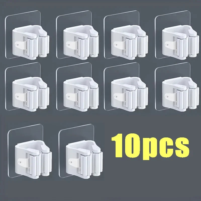 Ten wall mounted holders for mop and broom, shown in white plastic.