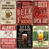 A collection of vintage-style metal bar signs featuring humorous text about beer and drinking