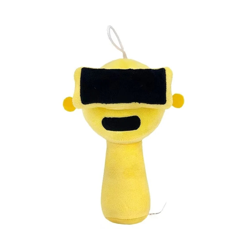 A yellow plush toy resembling a futuristic visor with black accents and a thin string attached.