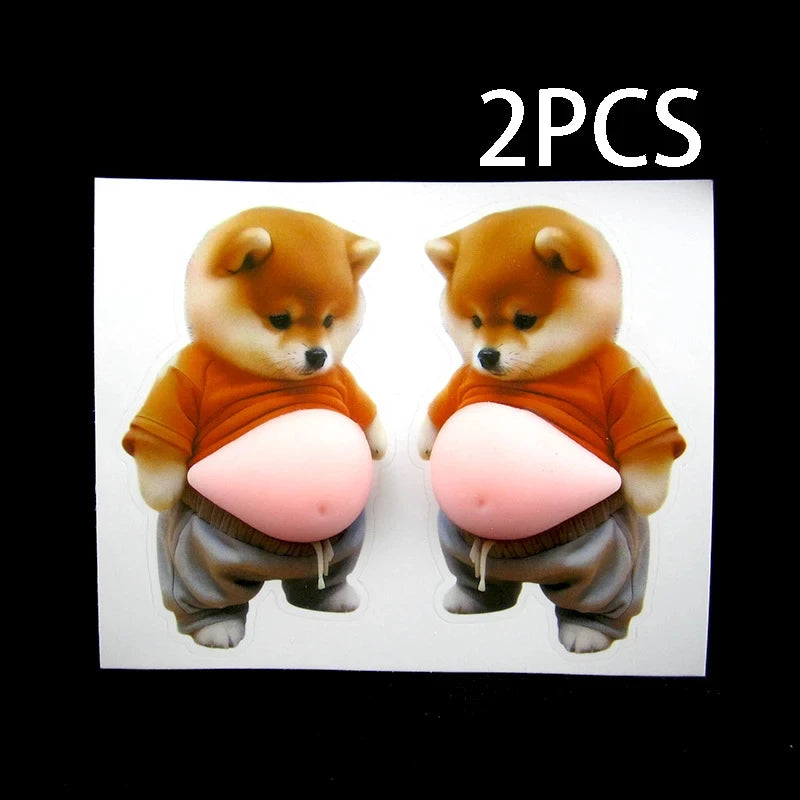 Two orange Shiba Inu squishy stickers with puffy bellies are shown on a white background.