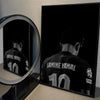 A framed print of a football player from behind, Lamine Yamal, wearing a black jersey with the number 10.