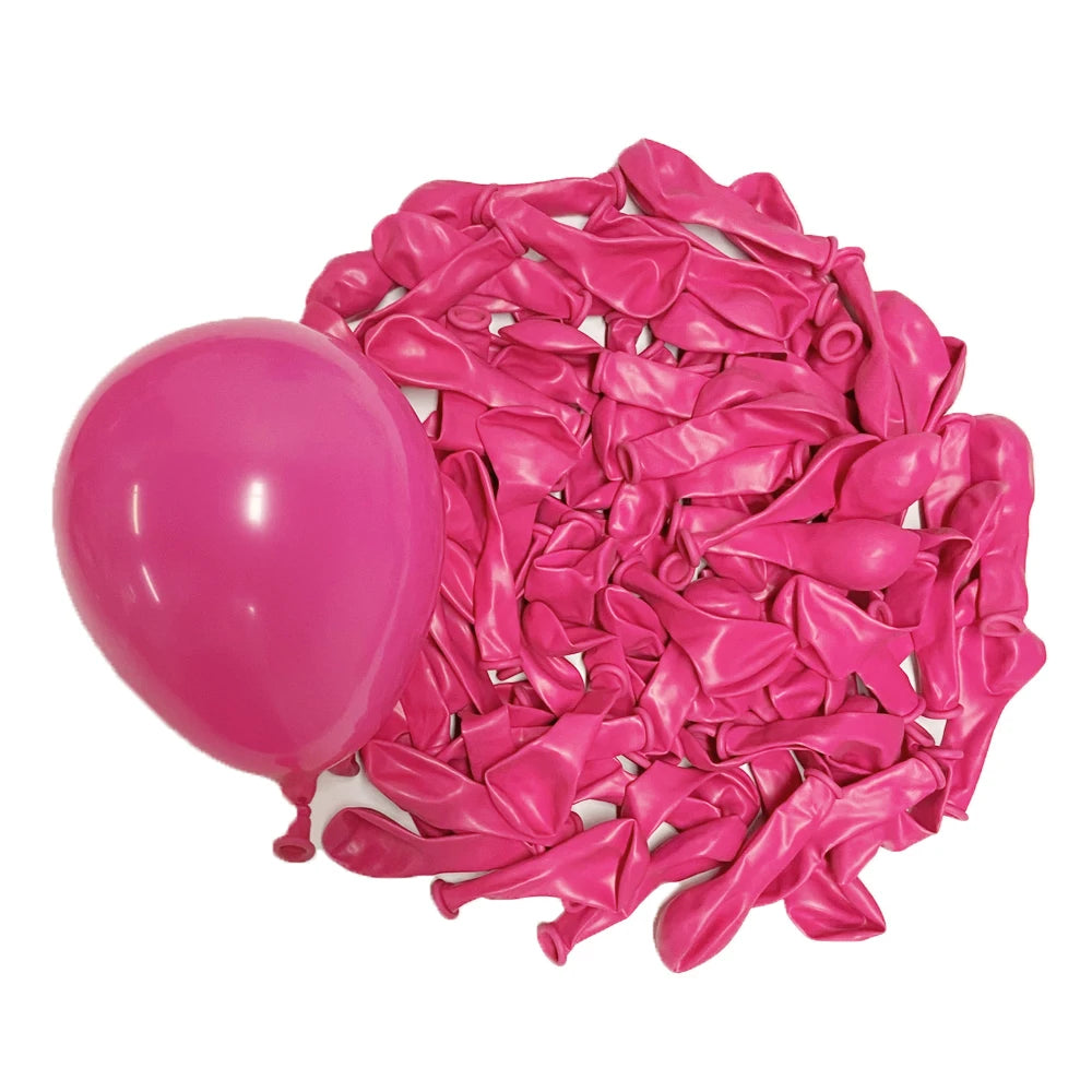 A pile of vibrant pink latex balloons for parties and celebrations.