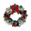 A 10-inch artificial Christmas wreath decorated with evergreen branches, red berries, and a large red velvet bow.
