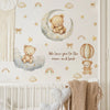 Wall stickers featuring a cute teddy bear sleeping on a crescent moon with rainbows and clouds for a child's room