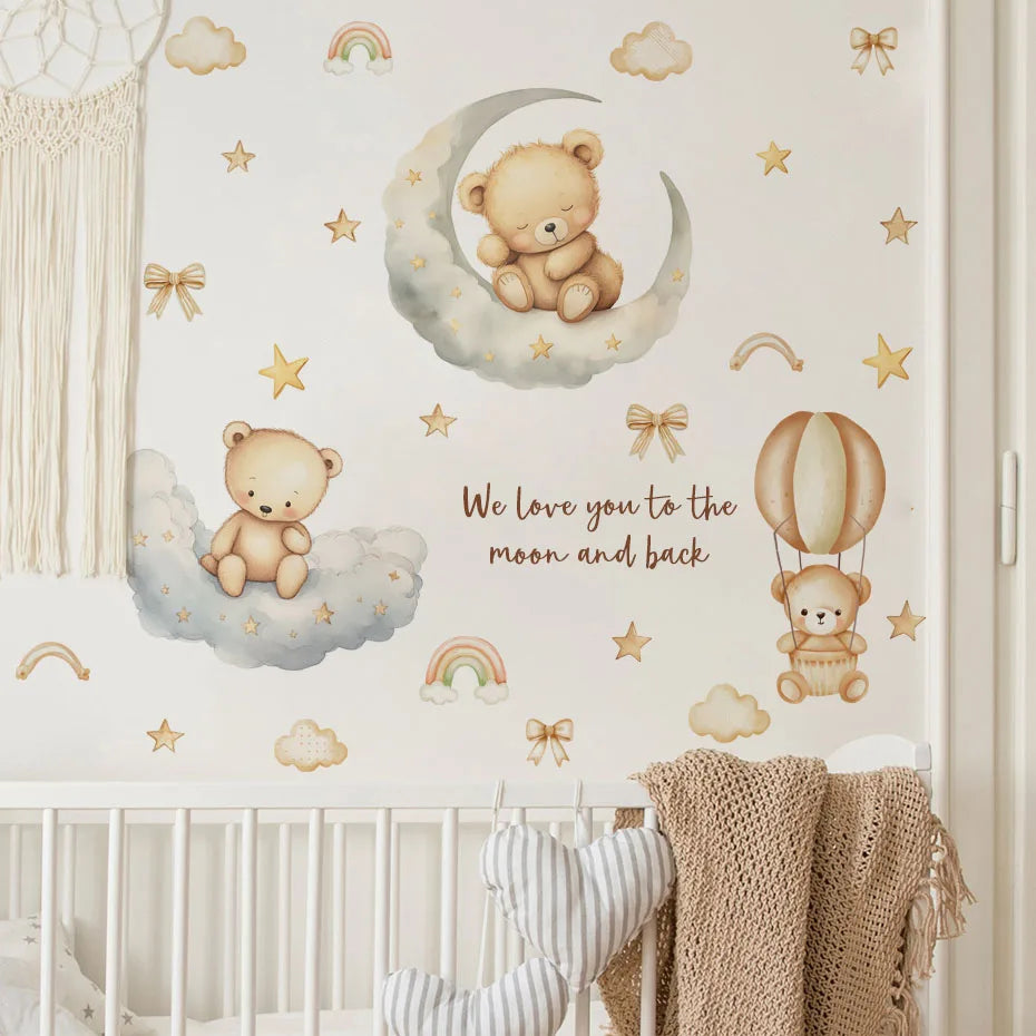 Wall stickers featuring a cute teddy bear sleeping on a crescent moon with rainbows and clouds for a child's room