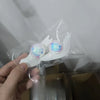 A hand holds a clear plastic bag containing a white snail disco ball sun catcher for window and desk.