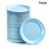 A stack of light blue 7-inch disposable paper plates.