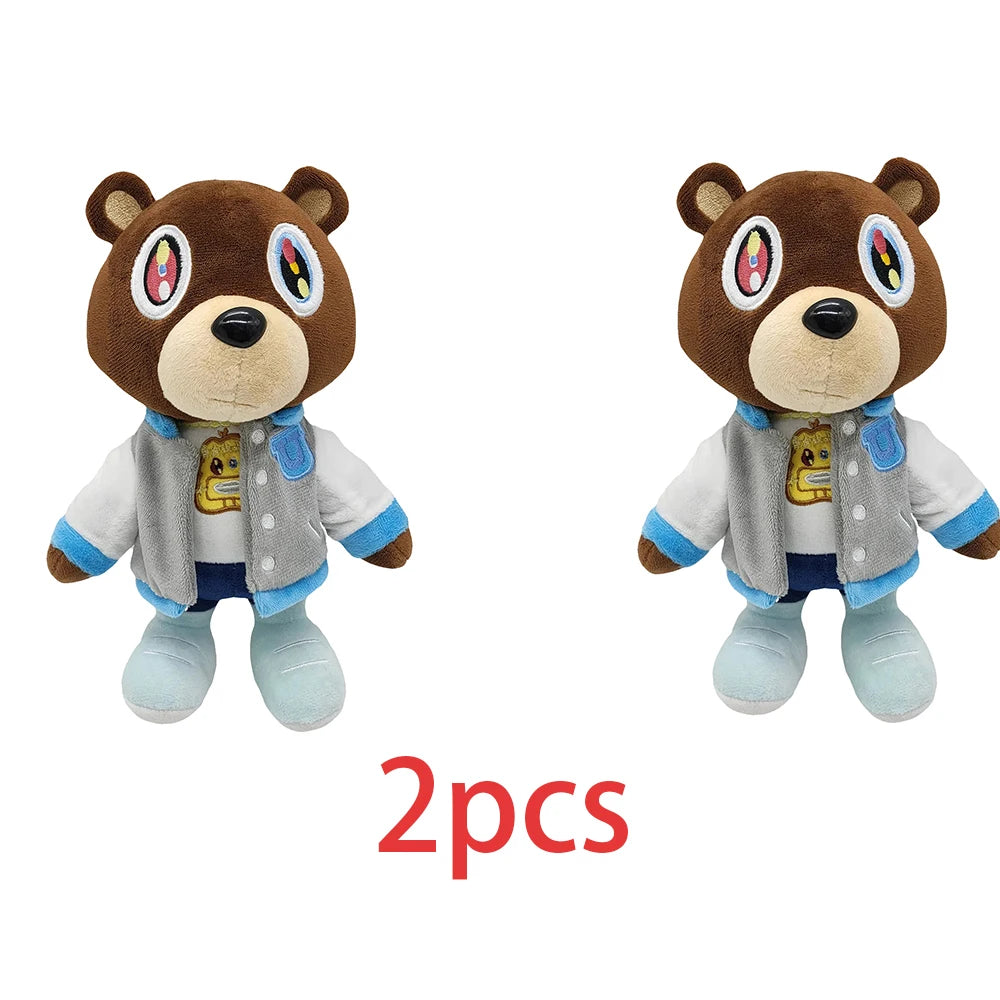 A pair of brown bear plush toys with graduation theme outfits and blue boots.