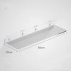 Clear acrylic floating shelf with wall mounts, measuring 50cm long and 15cm deep.