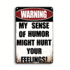 A vintage metal tin sign with a warning that says My sense of humor might hurt your feelings