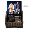 A wooden music box featuring an anime scene of Detective Conan characters and a miniature mechanical component.