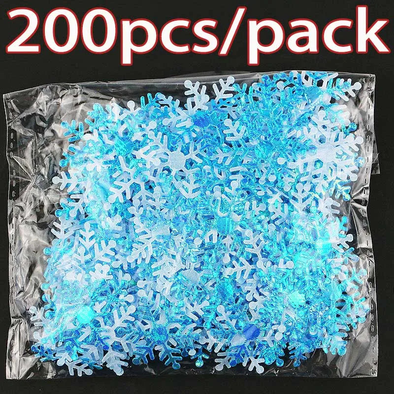 A package of 200 pieces of blue frosted snowflake confetti for holiday decorations.