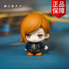 A collectible figure of Gojo and Geto from Jujutsu Kaisen, featuring orange hair and dark clothing.