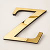 A shiny gold acrylic mirror letter Z wall sticker