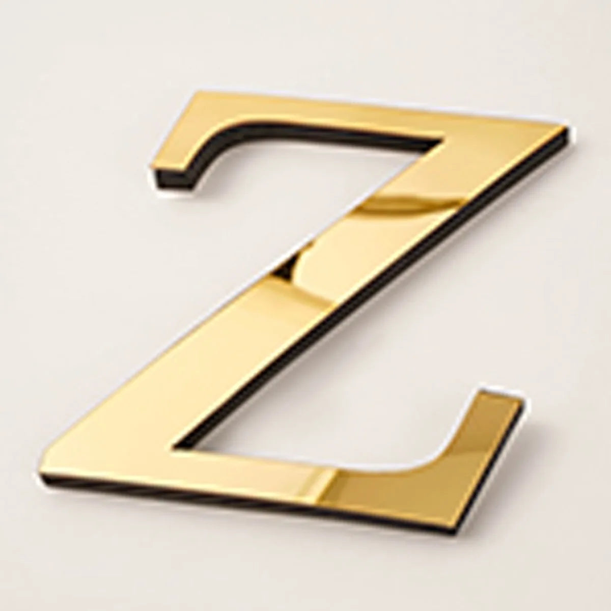 A shiny gold acrylic mirror letter Z wall sticker