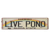 Vintage metal sign with the text Hawaii Live Pono Aloha State on a distressed background.
