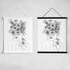 Two framed line art drawings of a woman's face partially obscured by flowers on a white background
