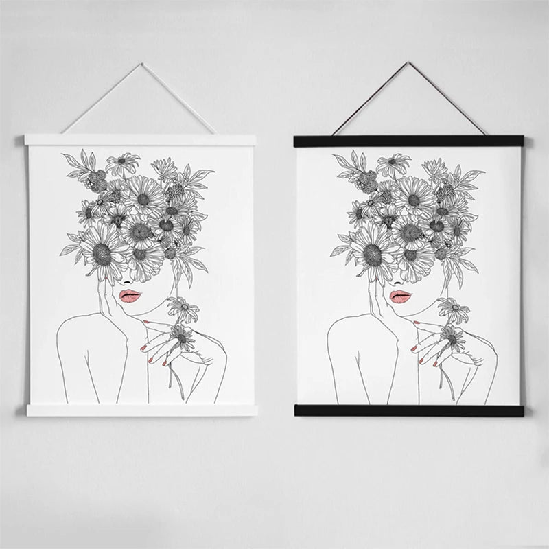 Two framed line art drawings of a woman's face partially obscured by flowers on a white background