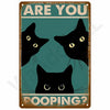 A vintage metal sign with the text ARE YOU POOPING displayed in distressed teal and brown colors.