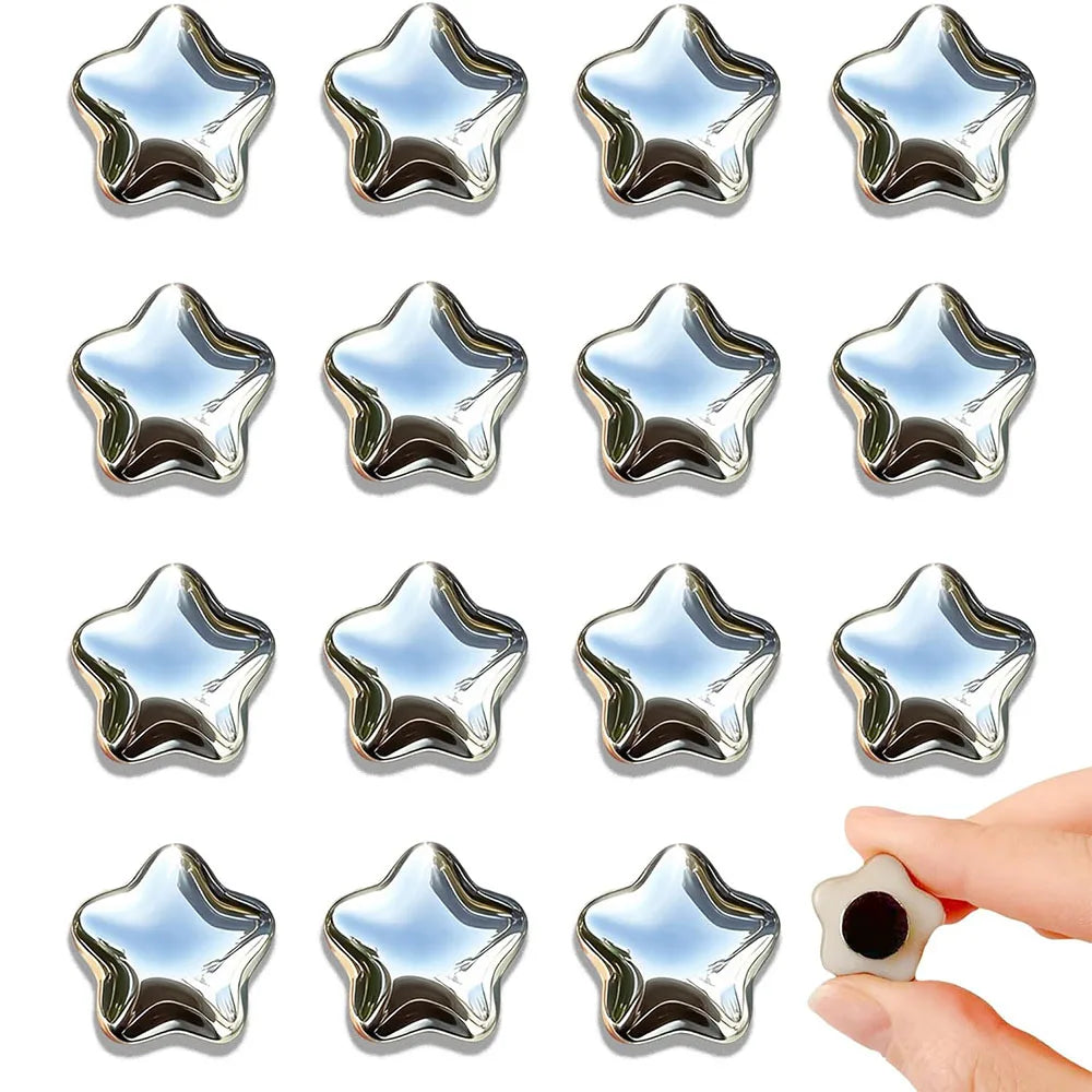 A set of fifteen shiny gold star-shaped fridge magnets.